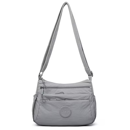 👜Women Solid Color Fashionable Multi-pocket Zipper Crossbody Bag